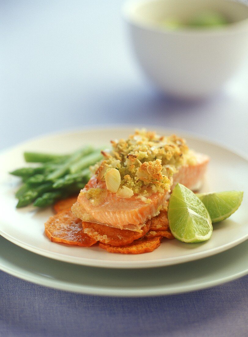 Salmon fillet with herb crust on slice of sweet potato