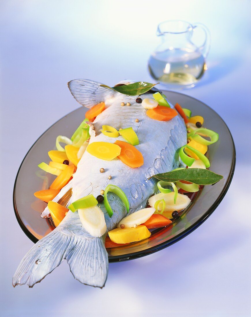 Carp cooked 'au bleu' with vegetables