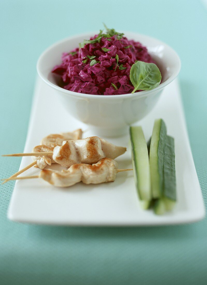 Spicy beetroot salad, chicken kebabs and courgette sticks