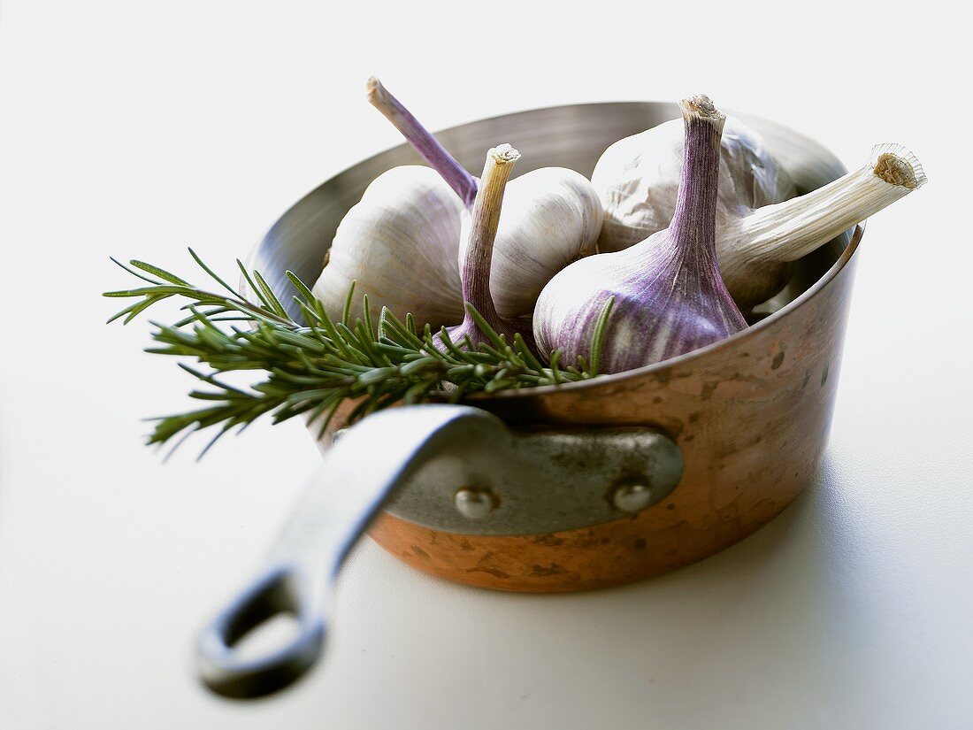 Garlic and rosemary in a pan