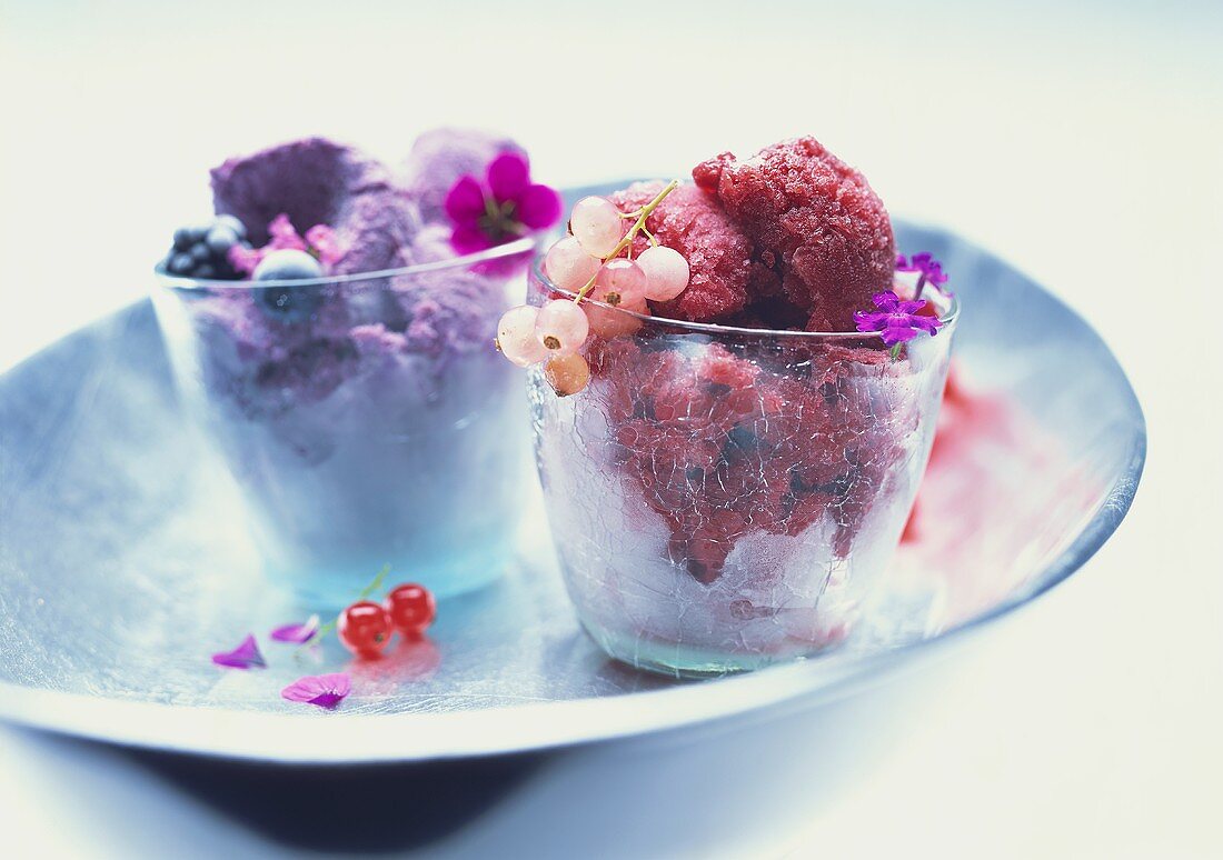 Redcurrant and blueberry sorbets in glasses