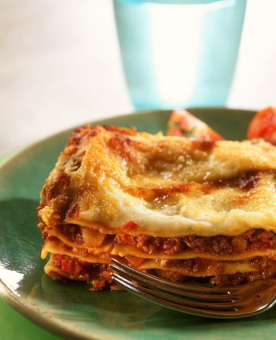 Piece of lasagne bolognese (lasagne with meat sauce)