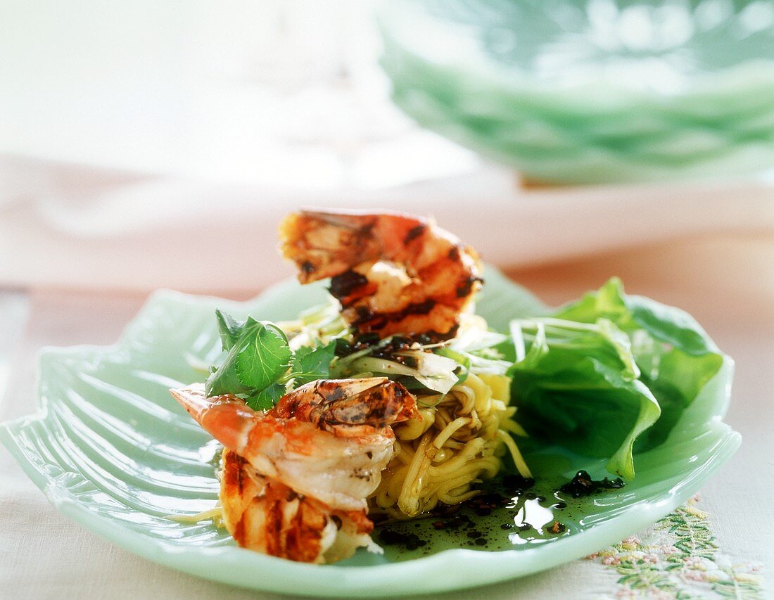 Grilled shrimps on spaghetti nest