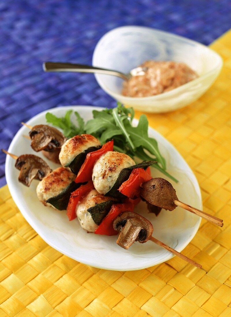 Barbecued kebabs with bread dough and vegetables