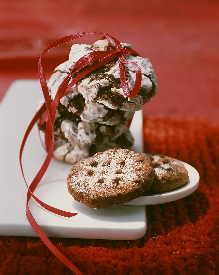 Several chocolate biscuits on a china platter