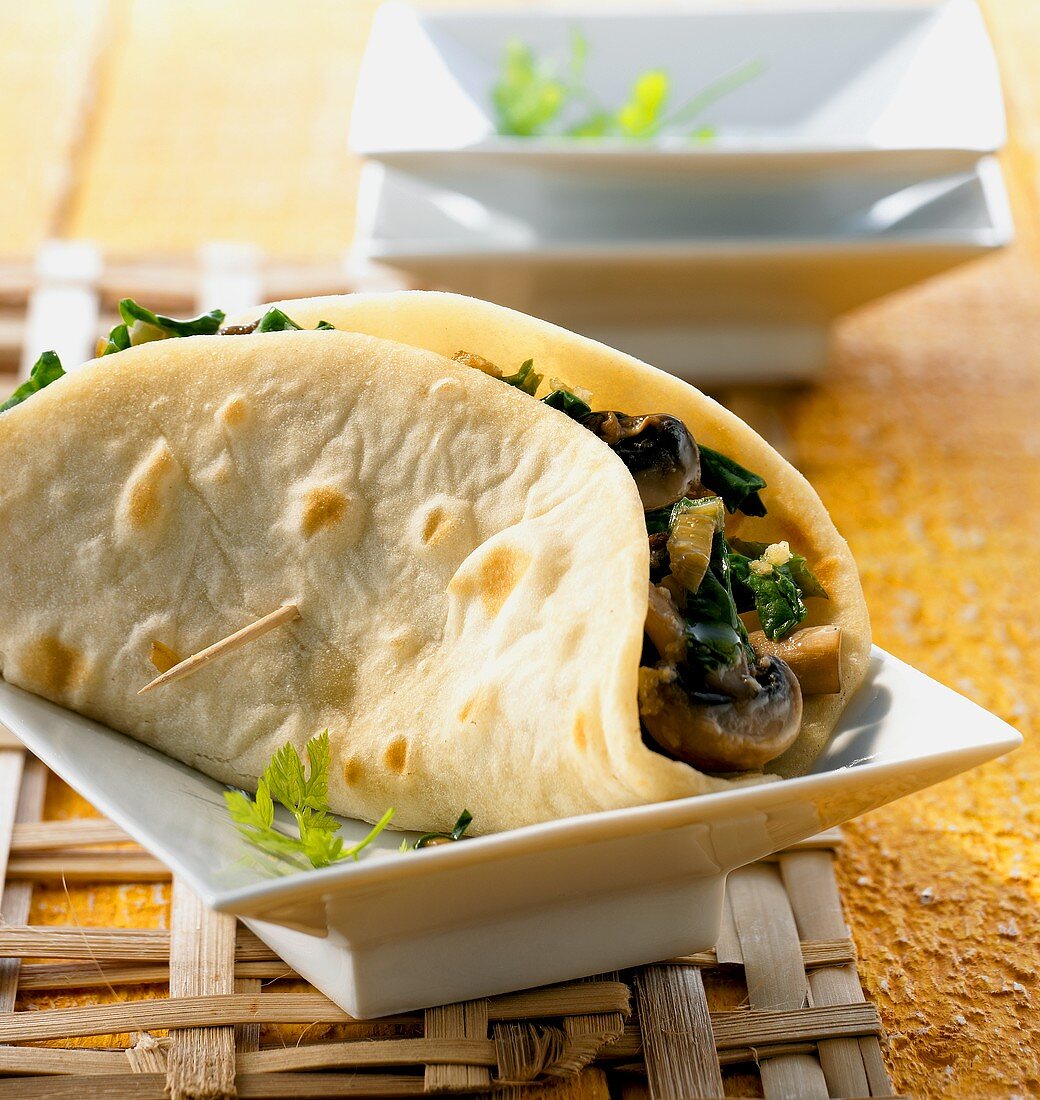 Asian pancake with mushroom and spinach filling