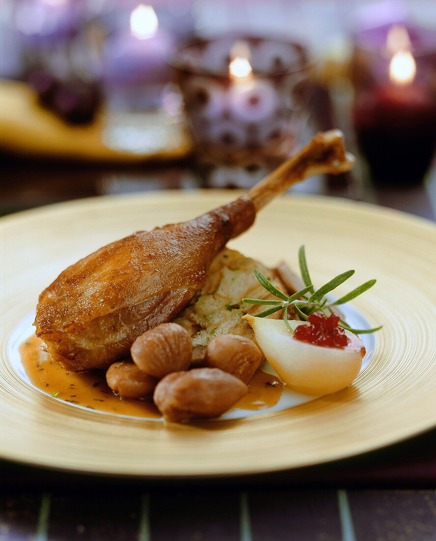 Roast leg of goose with sweet chestnuts and pear
