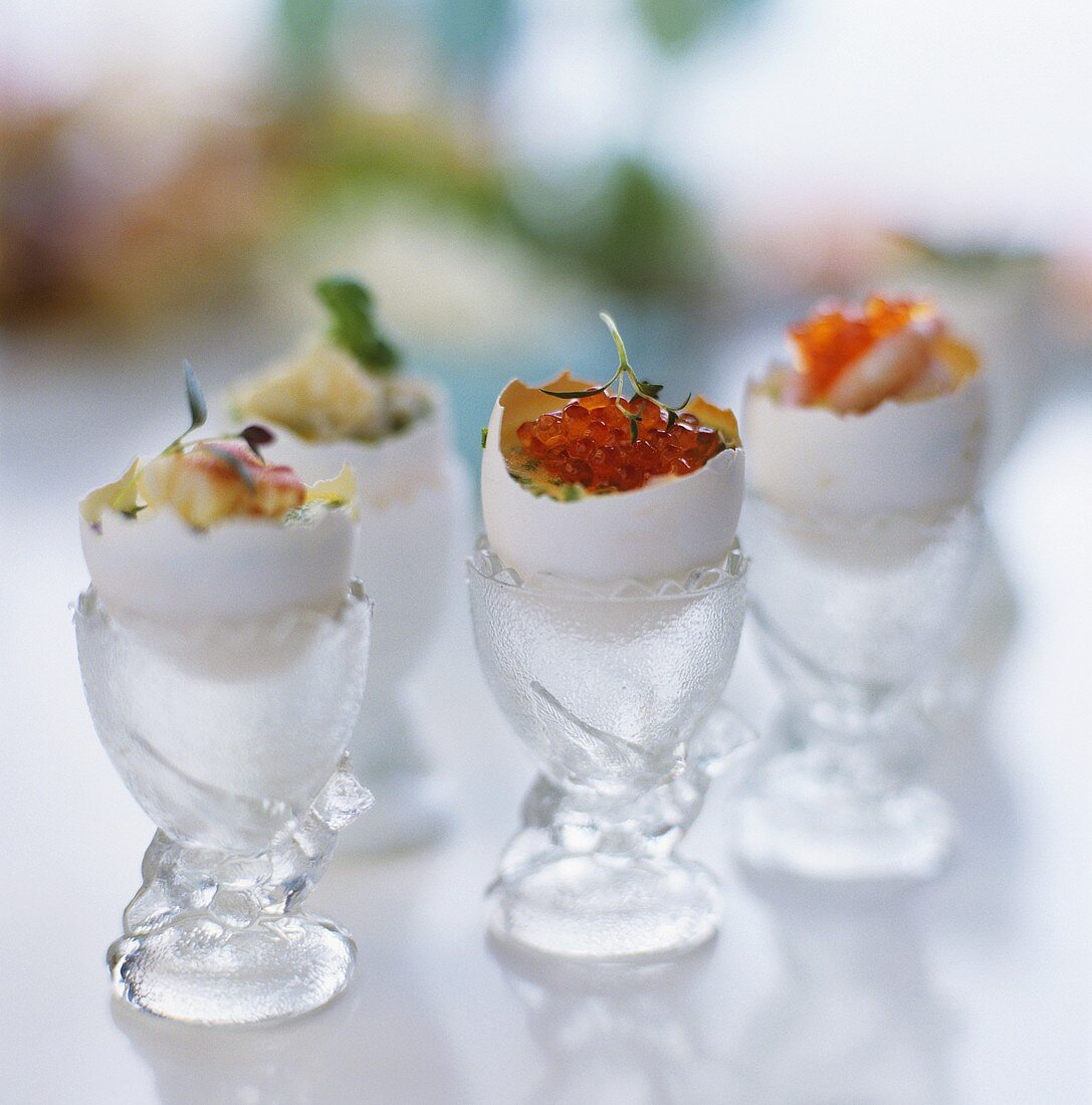 Boiled eggs with various toppings