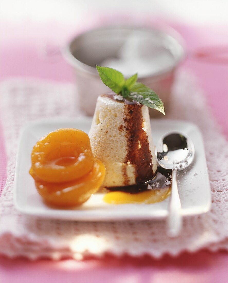 Quark soufflé with apricots and chocolate sauce