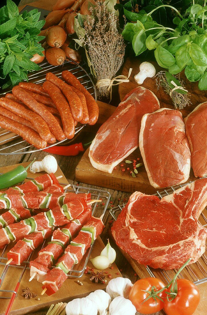 Barbecue ingredients: shashlik, cutlet, duck breast, sausages