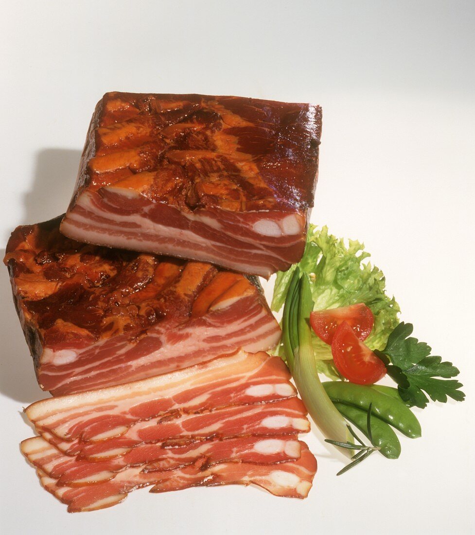 Smoked pork belly bacon, a slice cut