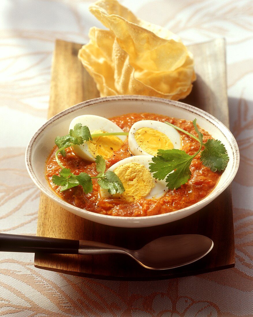 Egg curry (eggs in spicy curried tomato sauce)