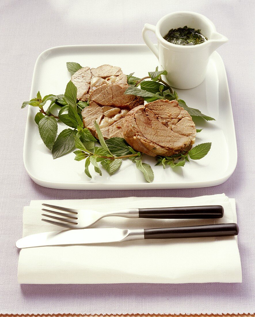 Lamb cooked in wine stock with mint sauce