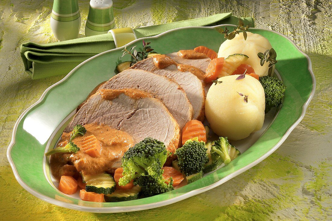 Smoked pork loin with vegetables and dumplings