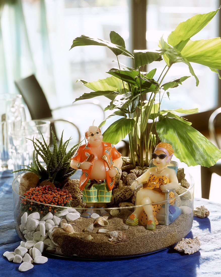 Miniature garden with coral bead plant & fish-tail palm