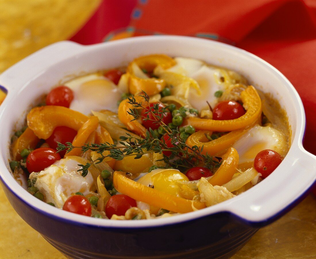Vegetable bake with eggs and cherry tomatoes