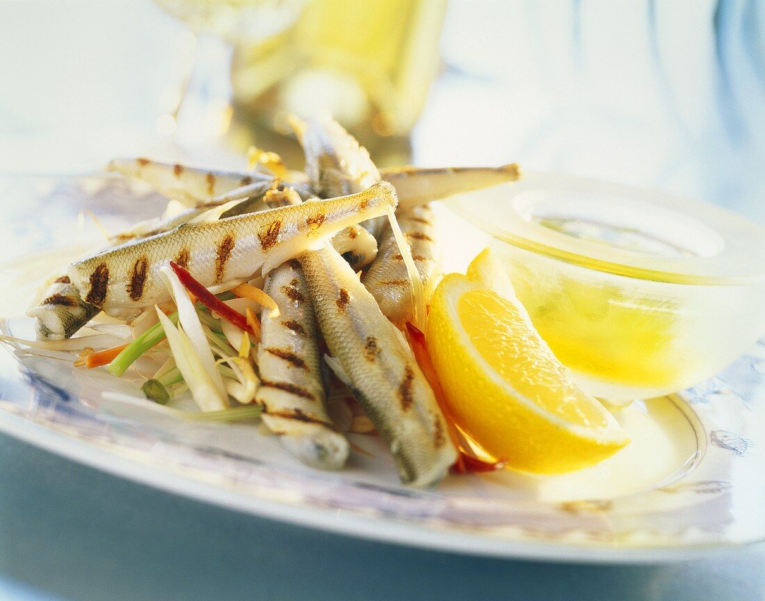 Grilled sand eel with lemon butter
