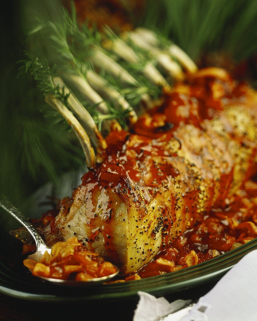 Rack of pork with rosemary and tomato sauce