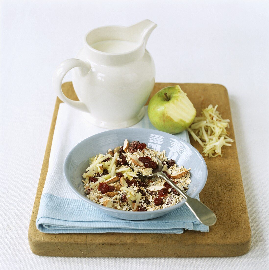 Muesli with grated apple, dried cherries and almonds