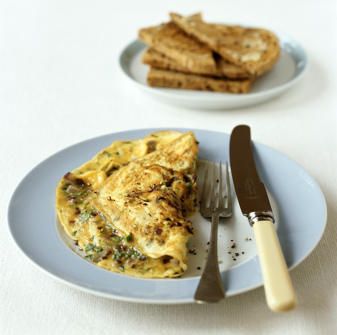 Spicy omelette with chopped green chillies and coriander