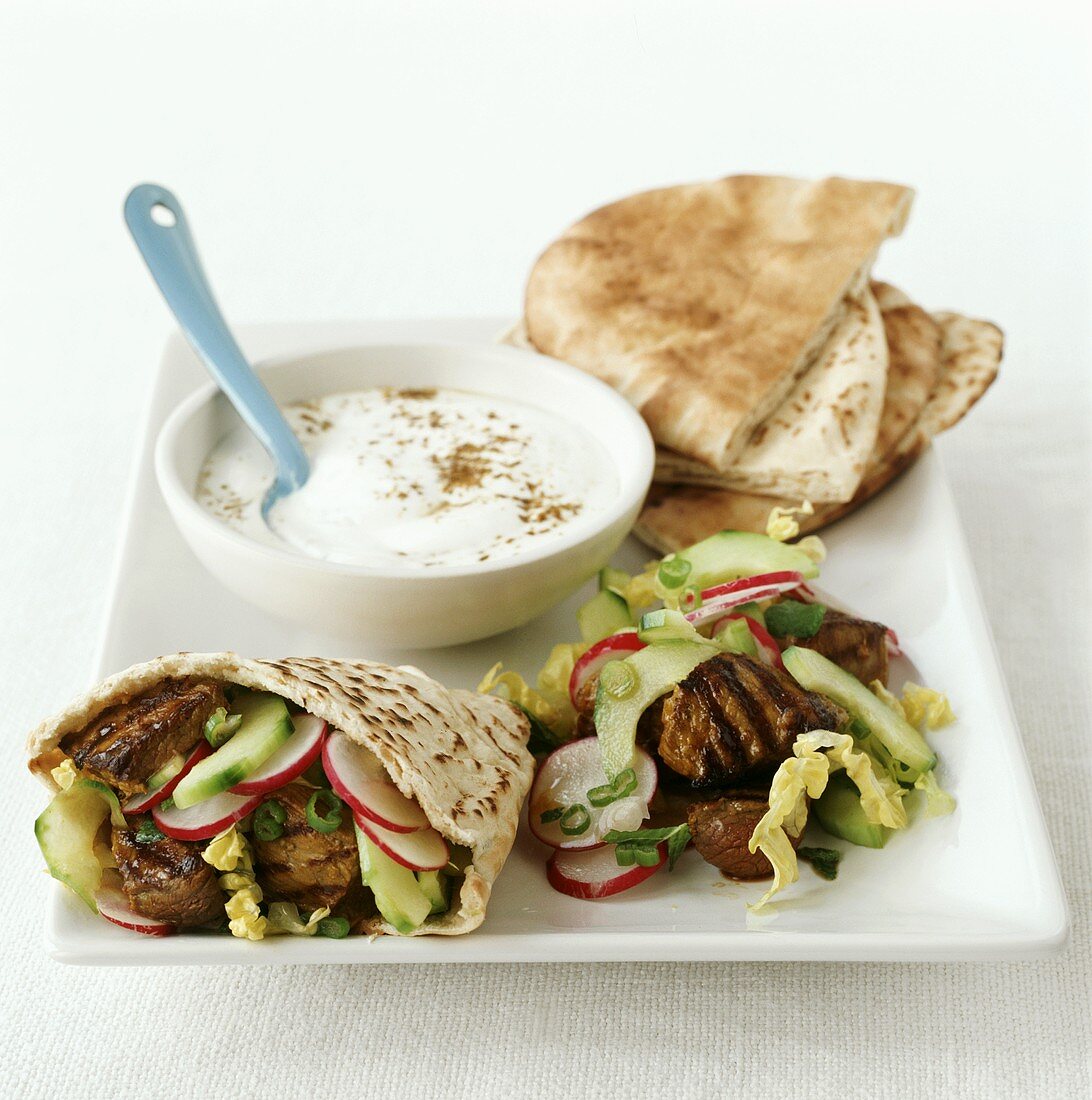 Lamb kebab with pita bread and yoghurt