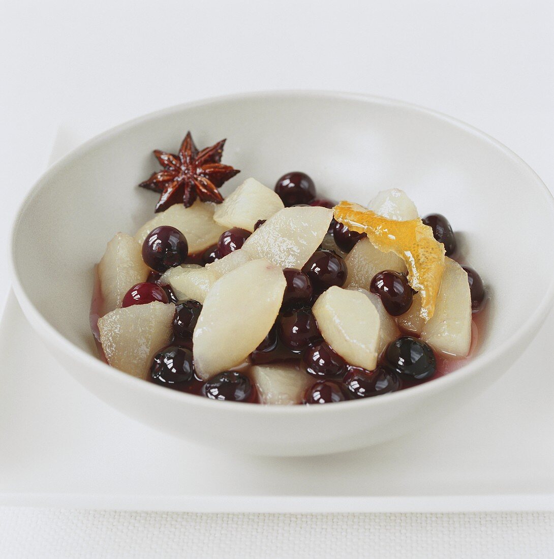 Pear and blueberry compote in small bowl
