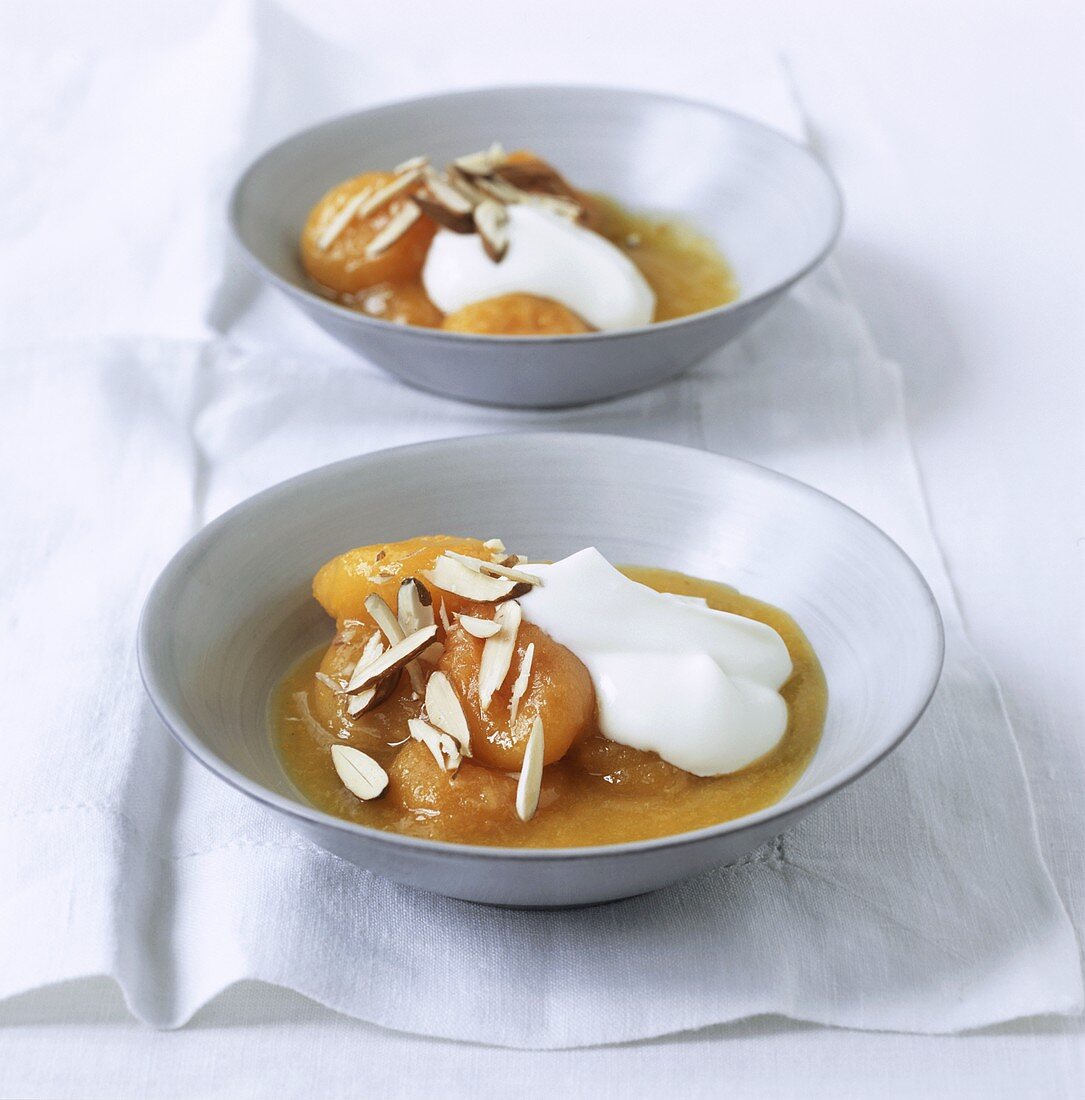 Apricot compote with low-fat quark and slivered almonds