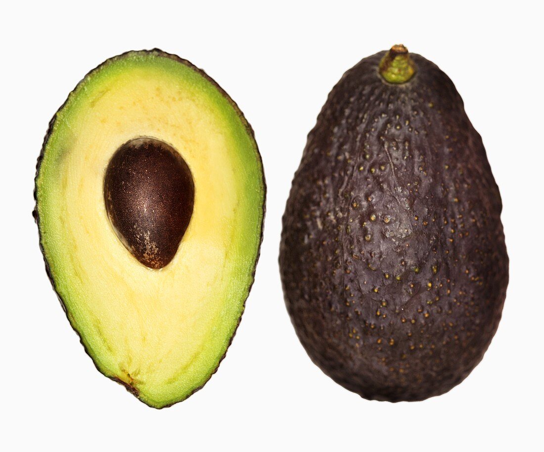 One half and whole avocado, 'Hass' variety