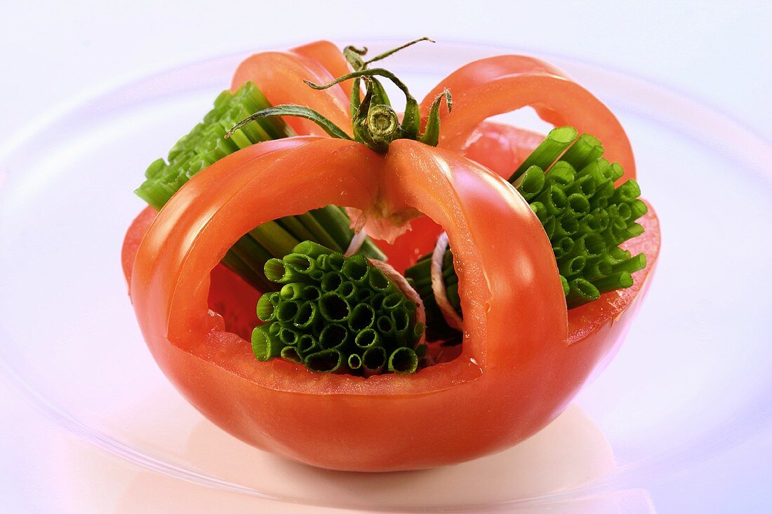 Tomato and chives as decoration
