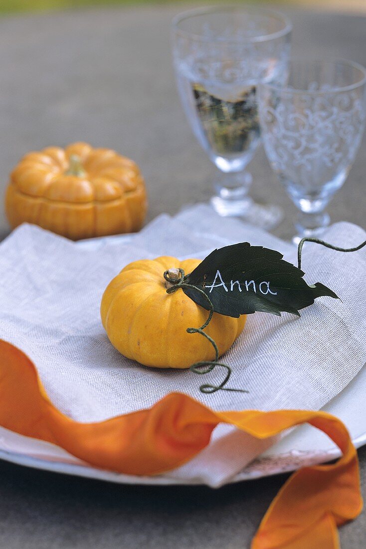 A table decorated with pumpkins