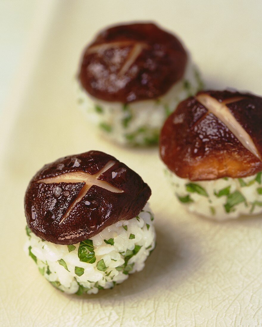 Three sushi with shiitake mushroom