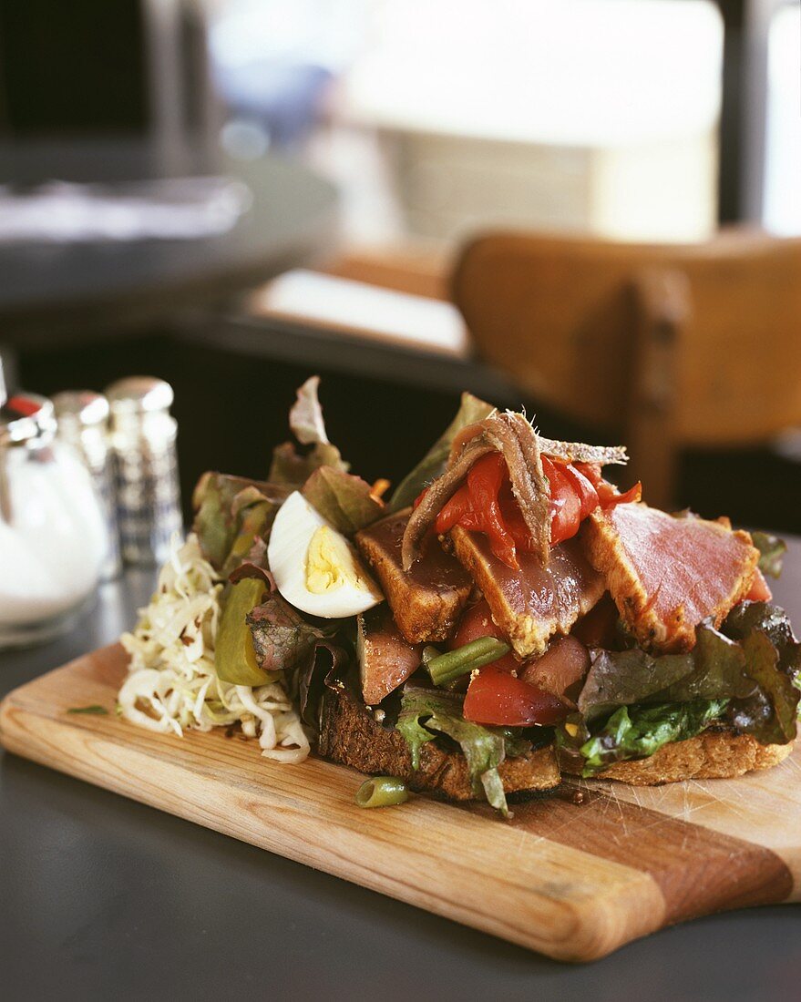 Seared tuna and anchovies in a sandwich