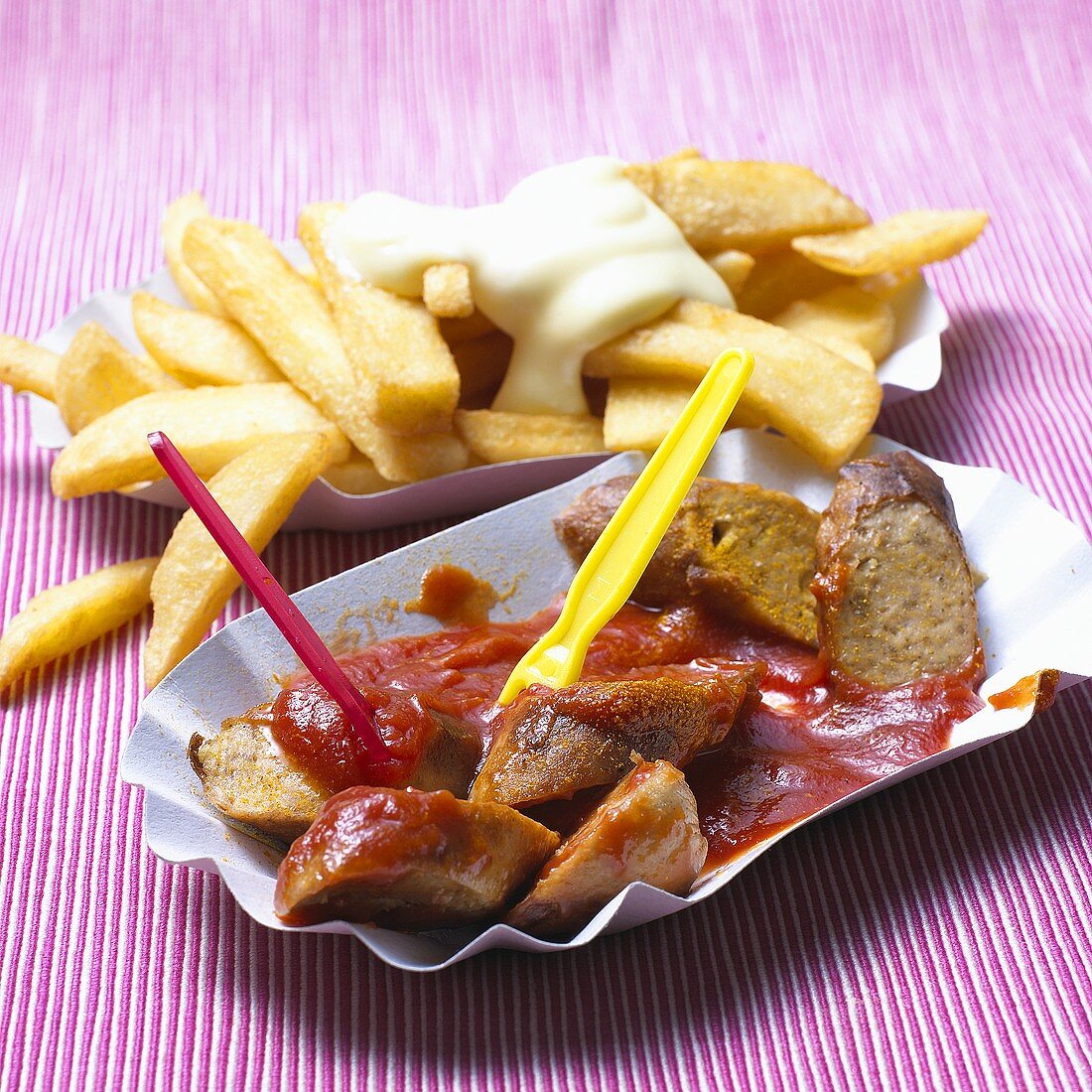 Vegetarian currywurst sausage with chips