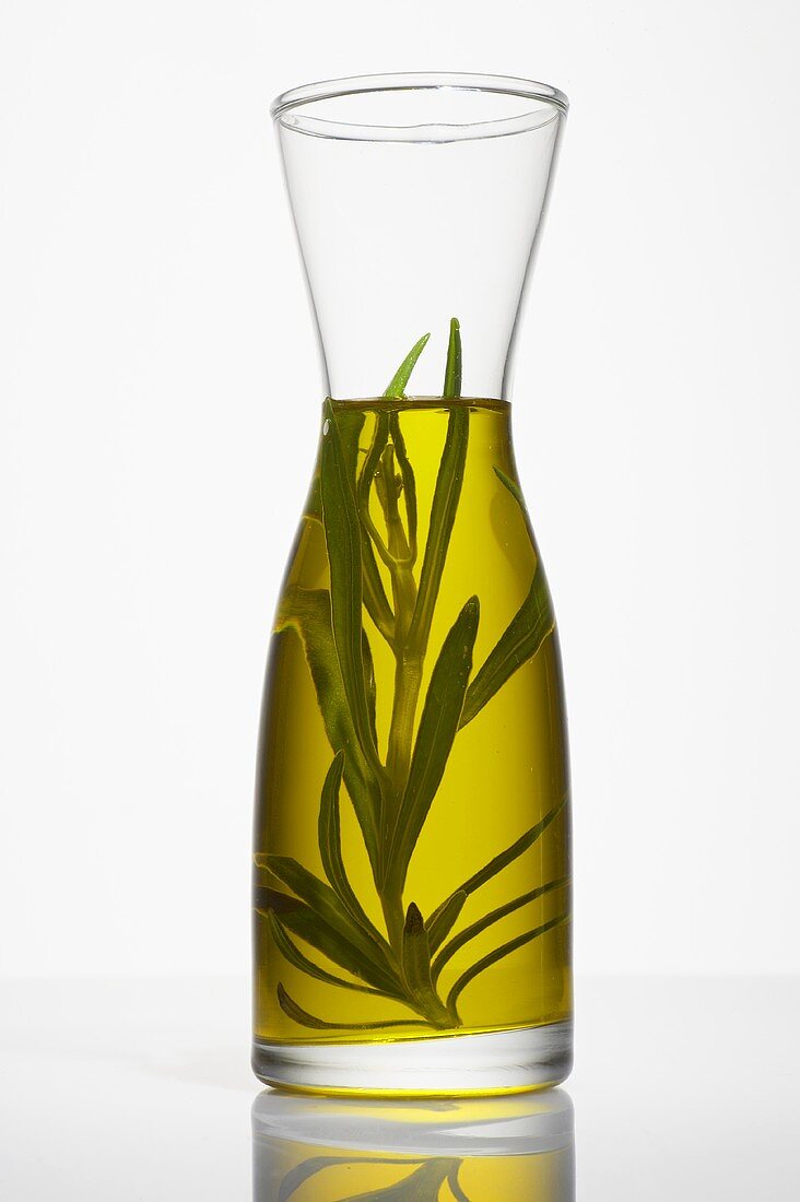 Rosemary oil in a carafe