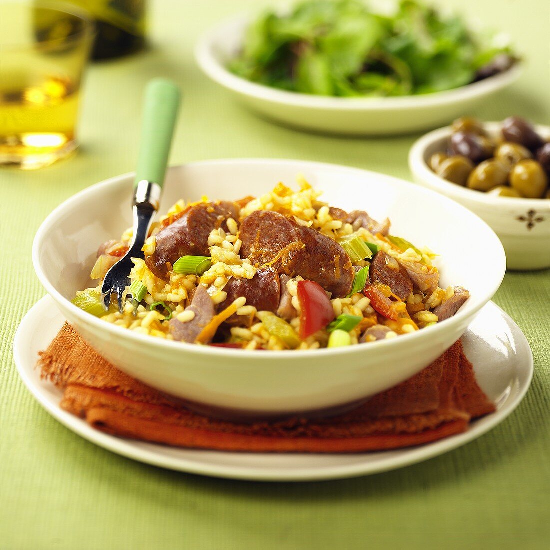 Risotto with spicy sausages and vegetables