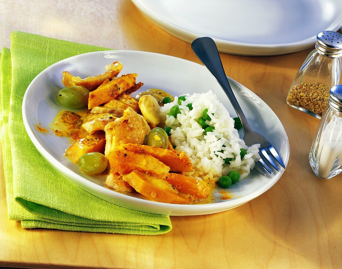 Chicken breast with pumpkin, fruit and rice with peas