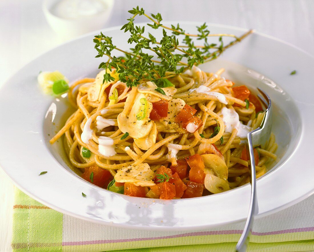 Spaghetti mit Champignons und Tomaten
