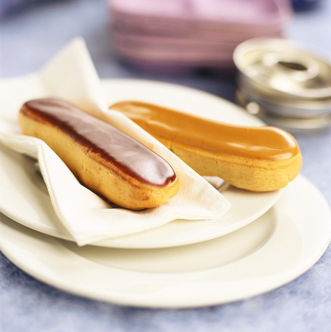 Two éclairs on plate