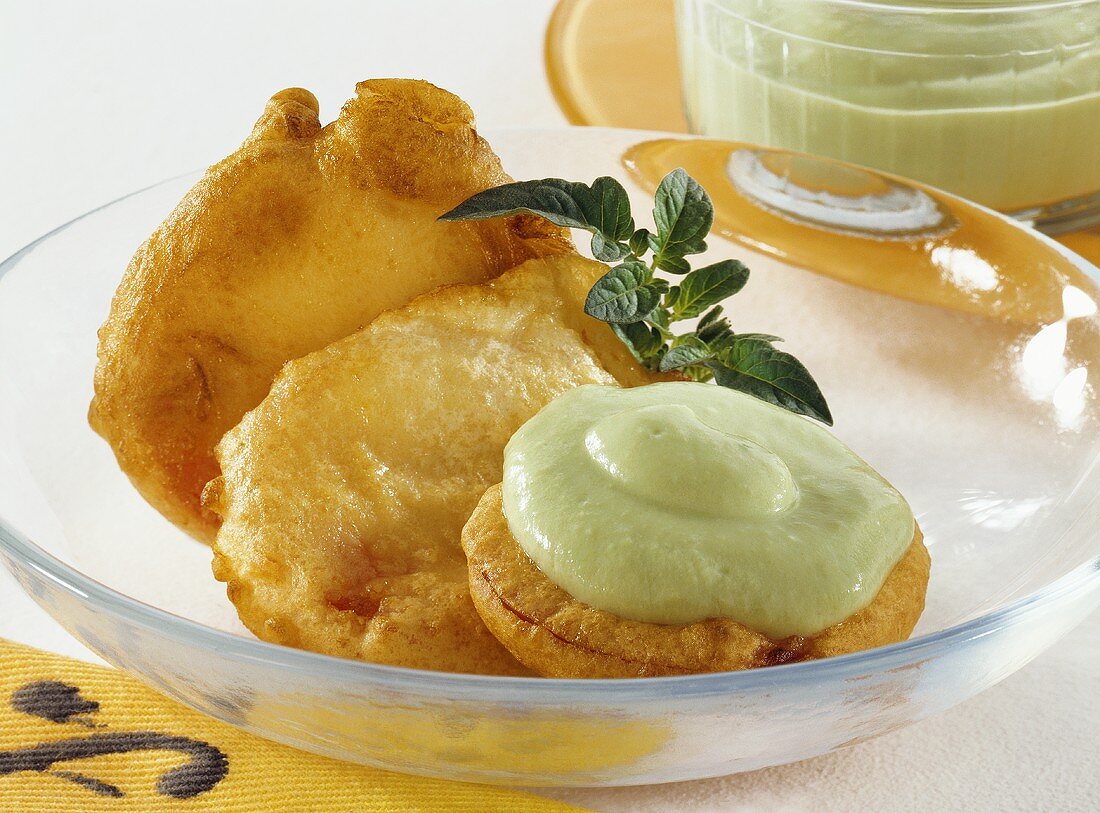 Tomatoes in batter with avocado dip