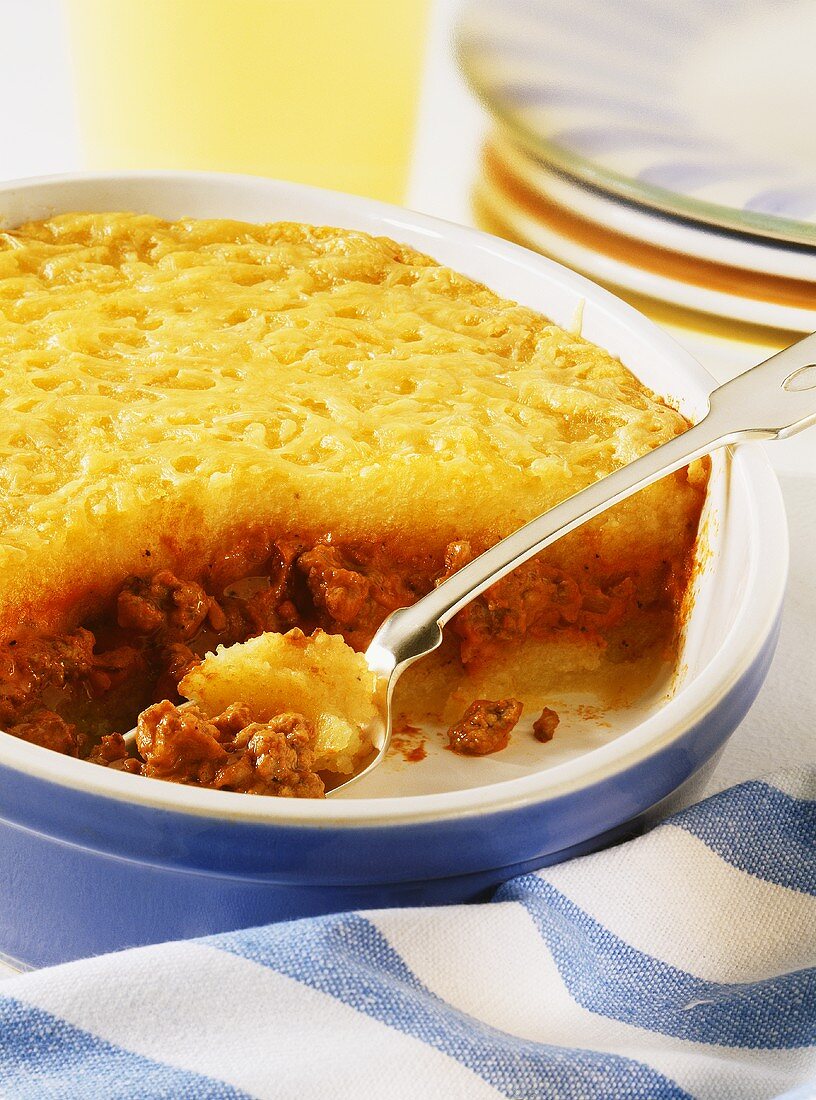 Baked mince and potato dish with cheese topping