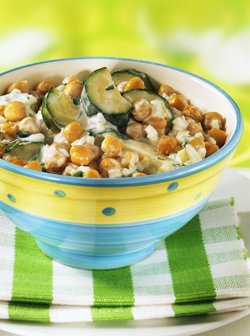 Pan-cooked chick-peas and courgettes with herb sauce