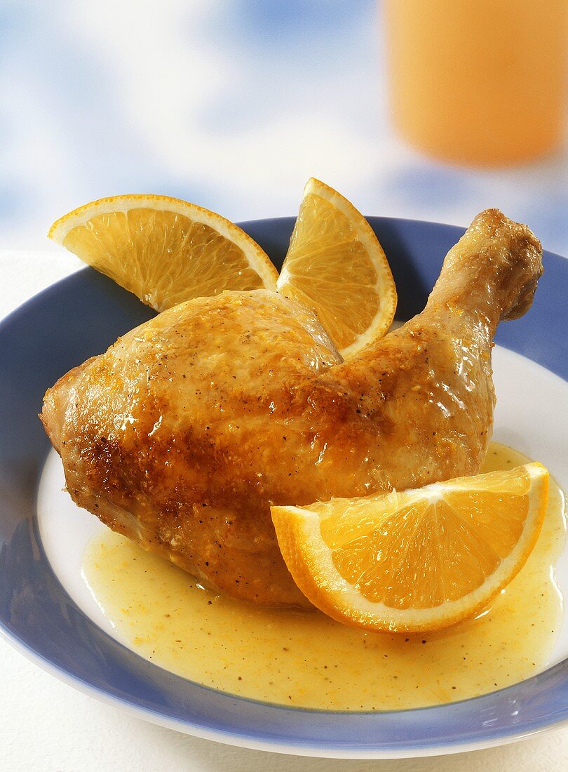 Chicken leg with orange sauce