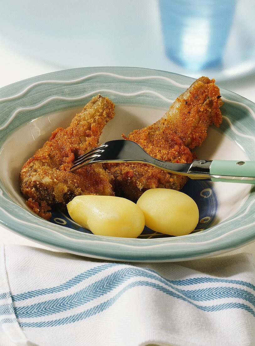 Breaded lamb cutlets with boiled potatoes