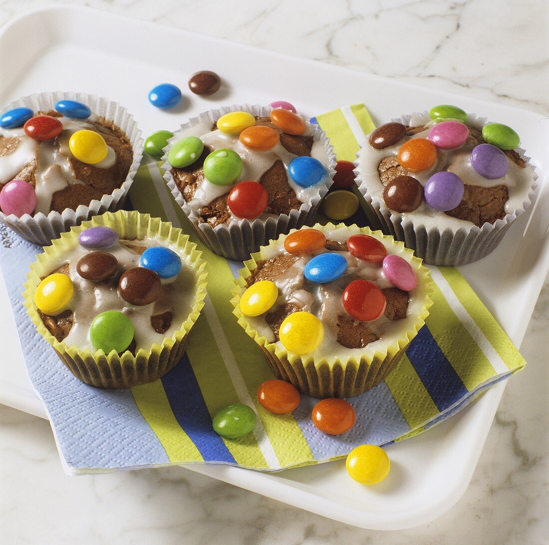 Muffins with colourful chocolate beans