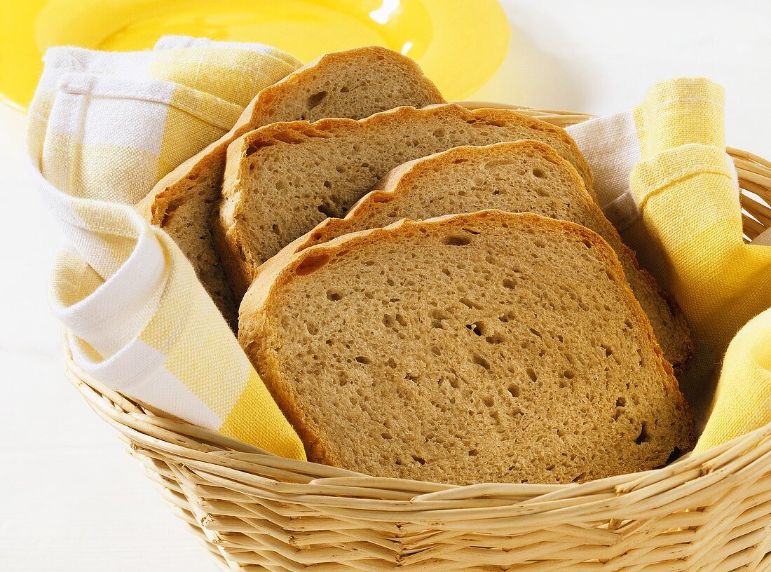 A few slices of mixed wheat and rye in bread basket