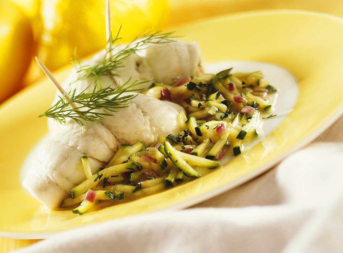 Plaice rolls on a bed of courgettes