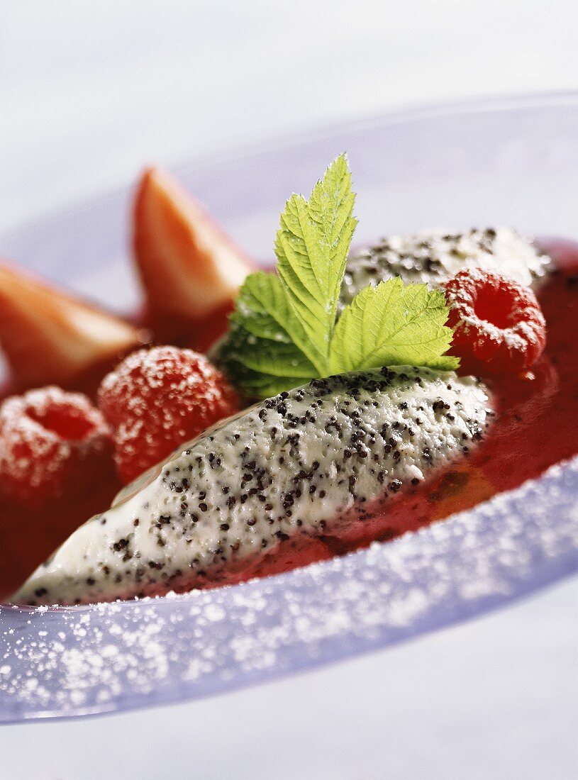 Poppy seed mousse with fruit sauce