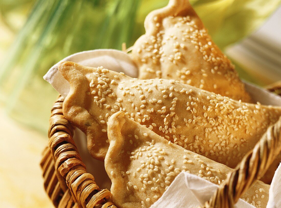 Pasties with sesame in basket