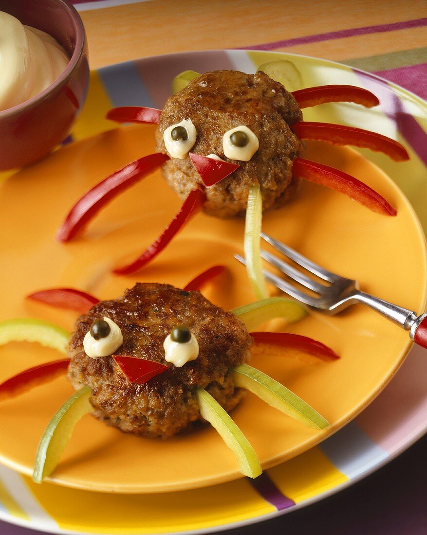 Two meat ball and pepper spiders