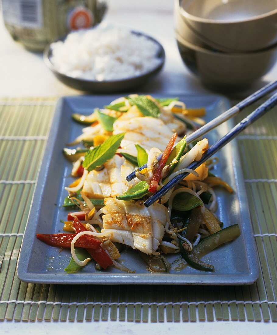 Squid on a bed of vegetables